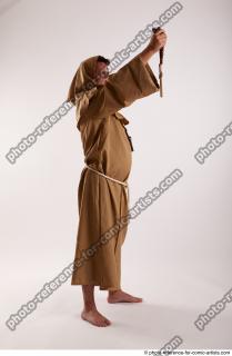 JOEL_ADAMSON MONK WITH CRUCIFIX